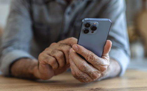 Close-up of hands holding a smartphone